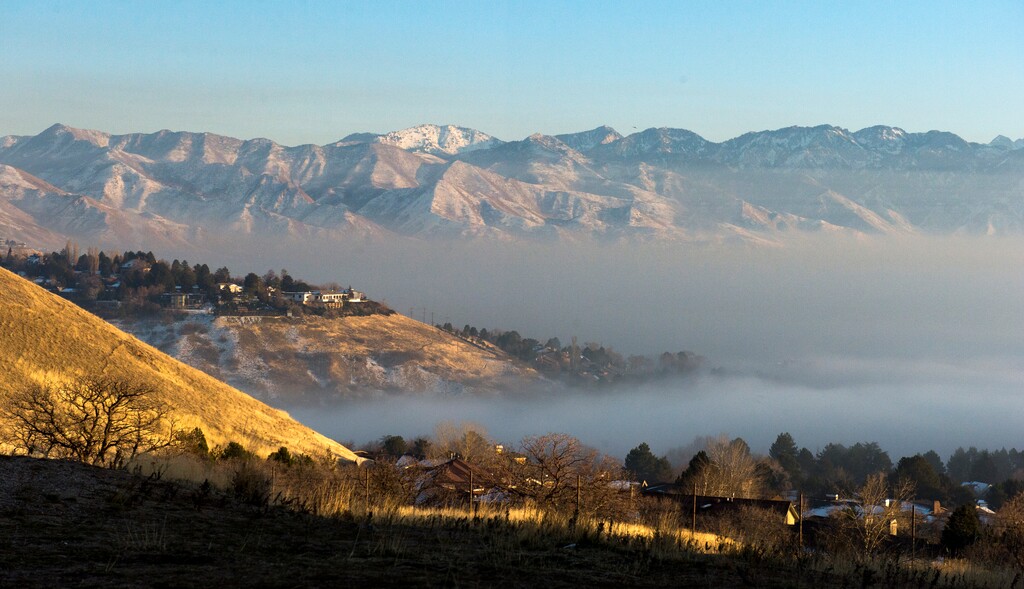 (Rick Egan  |  The Salt Lake Tribune)  Sun and blue skies above the smog in the valley, Monday, Dec. 11, 2017.