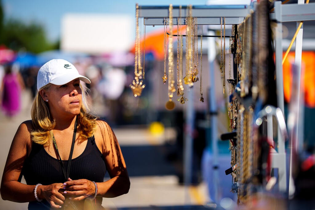 (Trent Nelson  |  The Salt Lake Tribune) Marisol Gonzalez sets out jewelry at the swap meet at the Redwood Drive In Theatreand  Swap Meet in West Valley City on Saturday, June 26, 2021.