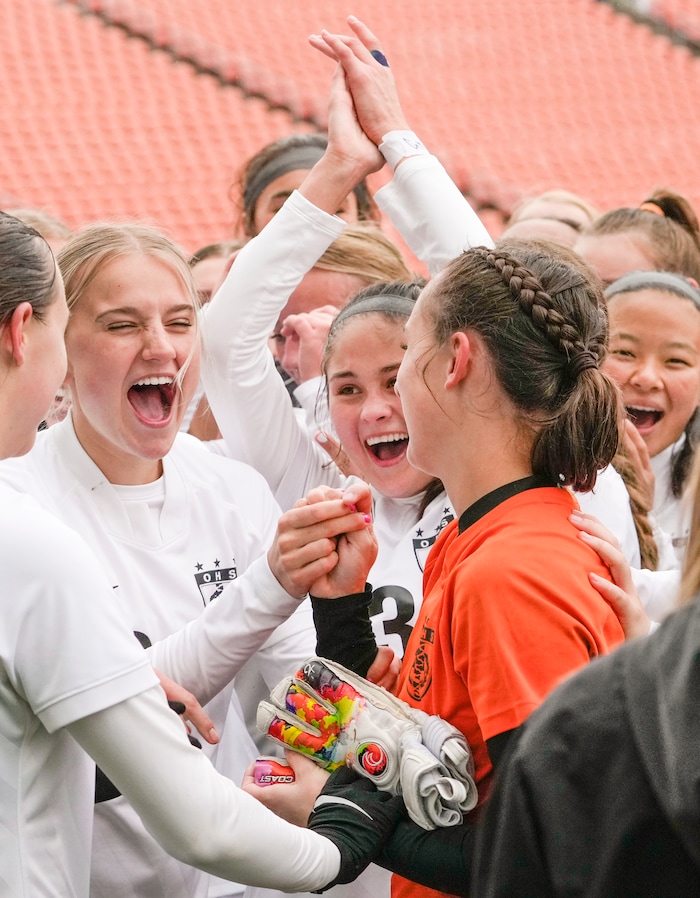 (Leah Hogsten | The Salt Lake Tribune)  Ogden celebrates goalie Emily Blackford, crediting her with the win and shouting "MVP." Ogden High School defeated Morgan High School, 1-0, to win the 3A State Soccer Championship game Oct. 23, 2021 at Rio Tinto Stadium.
