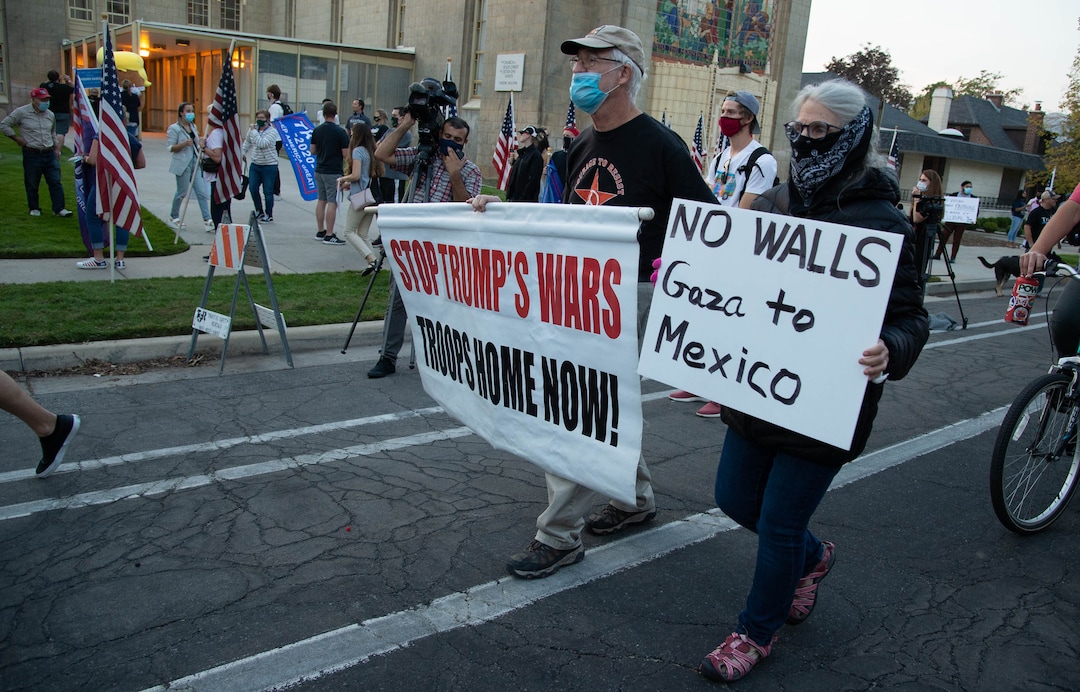 (Francisco Kjolseth  |  The Salt Lake Tribune) Supporters and counter protesters of President Donald Trump rally near Kingsbury Hall on the University of Utah campus in Salt Lake City on Wednesday, Oct. 7, 2020, during the vice presidential debate.