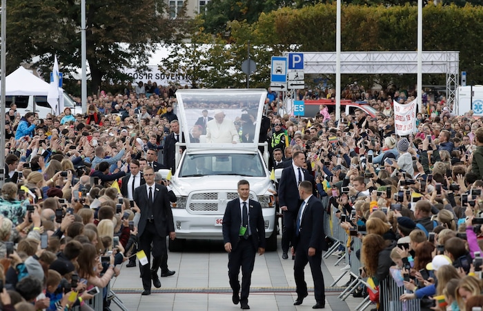 (Andrew Medichini  |  AP Photo)  Pope Francis greets faithful as he arrives for a meeting with youths in Vilnius, Lithuania, Saturday, Sept. 22, 2018. Pope Francis begins a four-day visit to the Baltics amid renewed alarm about Moscow's intentions in the region it has twice occupied.