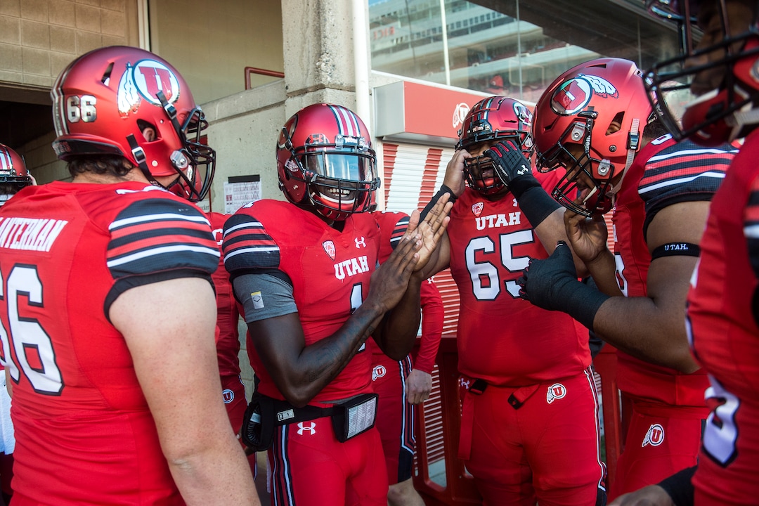 (Chris Detrick  |  The Salt Lake Tribune)  Utah Utes quarterback Tyler Huntley (1) and his teammates gather before the game at Rice-Eccles Stadium Saturday, October 21, 2017. 