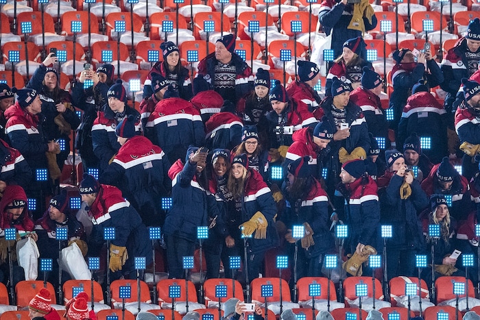 (Chris Detrick  |  The Salt Lake Tribune)  Members of team USA take selfies during the Pyeongchang 2018 Winter Olympics opening ceremony at Olympic Stadium Friday, February 9, 2018.  