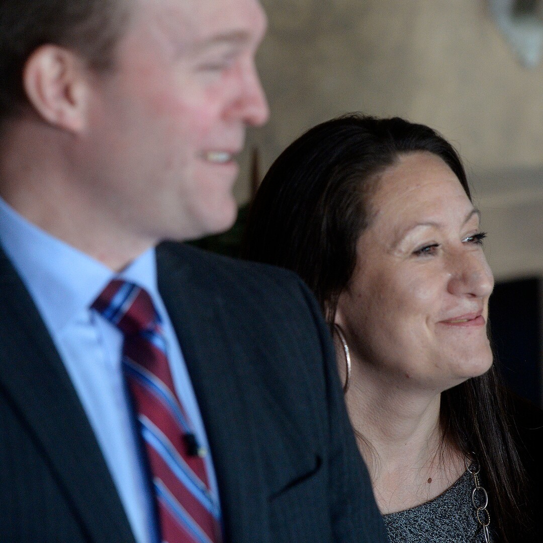 (Al Hartmann  |  The Salt Lake Tribune) 	Salt Lake County Mayor Ben McAdams, left, stands with Destiny Garcia, (the first Operation Rio Grand client to move into a sober living home) at the opening of a new sober living housing program Monday Jan. 29 in Murray. The combined county and state funded program places people in safe, affordable housing while continuing to receive treatment for substance use.  The residential home is now open in Murray providing space for 12 residents. 
