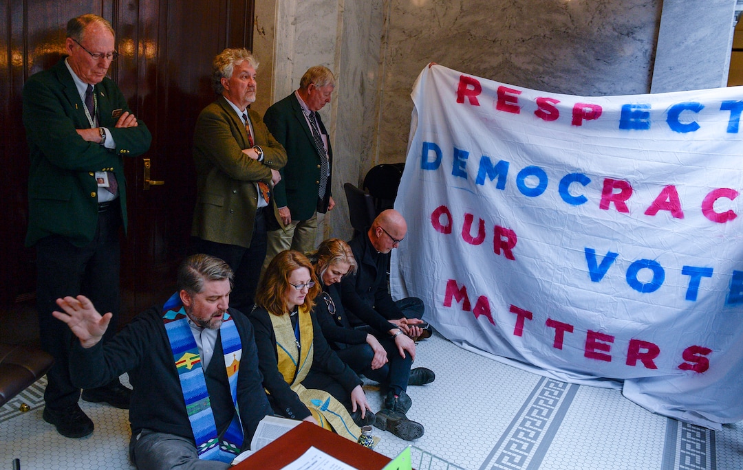 Leah Hogsten  |  The Salt Lake Tribune  Faith leaders l-r Rev. Curtis Price with The First Baptist Church of Salt Lake City, Rev. Monica Dobbins with the First Unitarian Church of Salt Lake City, Zen Buddhist Anna Zumwalt and Pastor David Nichols with Mt. Tabor Lutheran Church demonstrate in opposition to SB96 outside the Utah House chambers, Feb. 8, 2019. 