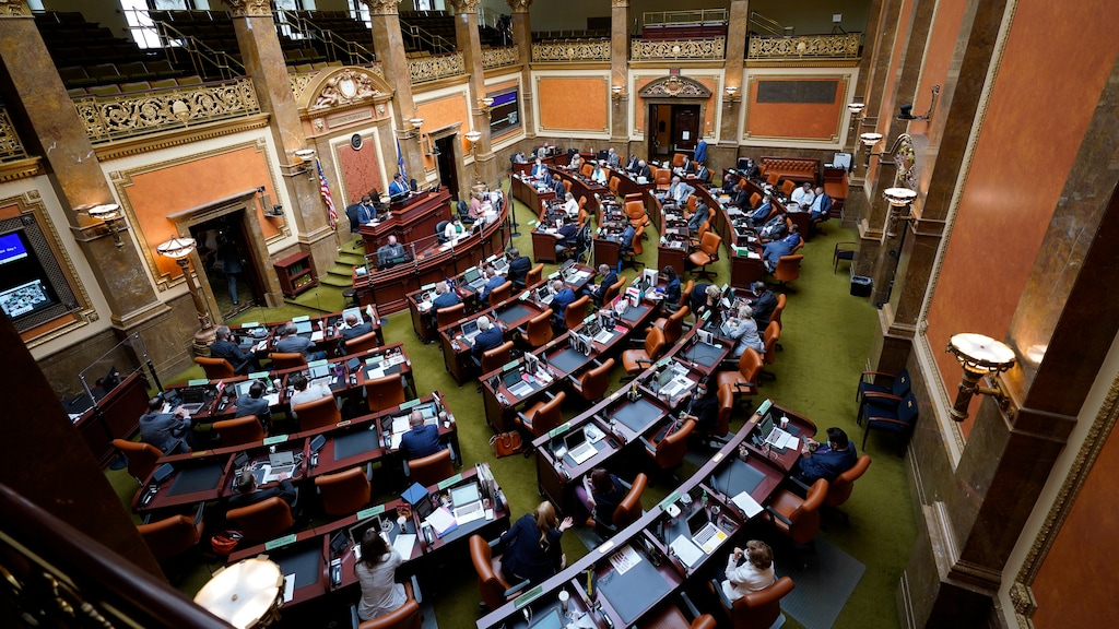 The Utah House of Representatives convenes for a special session of the Legislature at the Utah State Capitol Thursday, Aug. 20, 2020, in Salt Lake City. Utah legislators unanimously voted during a special session Thursday in favor of a plan for the November election that includes outdoor voting and additional ballot drop boxes in rural parts of the state. (AP Photo/Rick Bowmer)