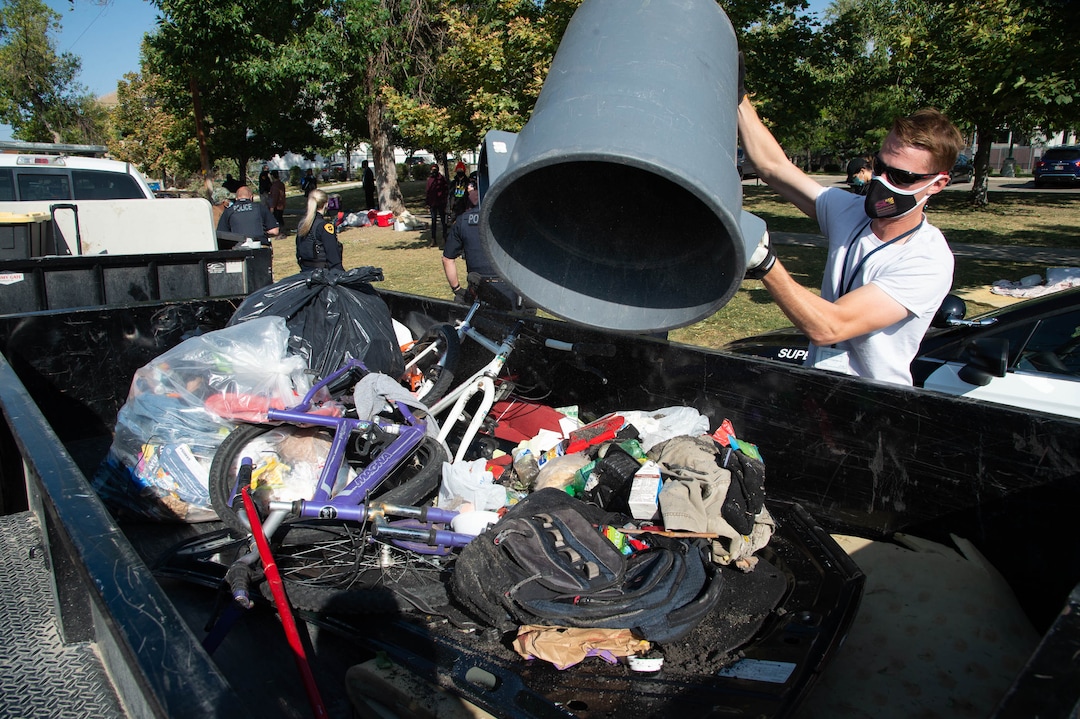 (Francisco Kjolseth  |  The Salt Lake Tribune) The Salt Lake County Health Department forces a clean up of homeless camps set up near Taufer Park in Salt Lake City on Thursday, Sept. 10, 2020.
