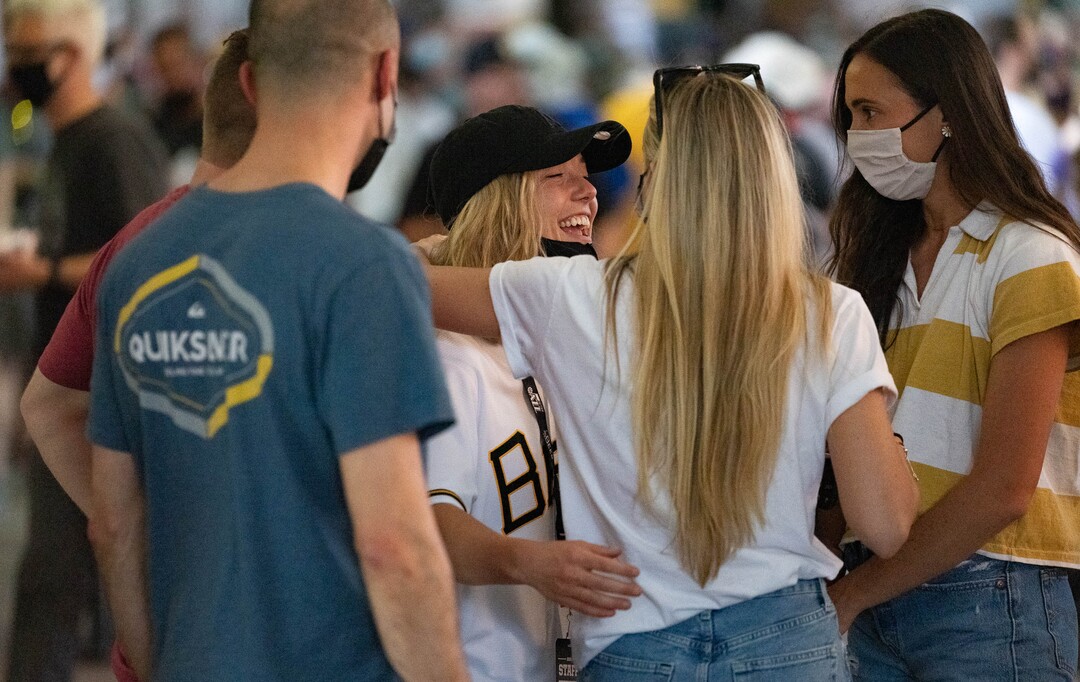 (Francisco Kjolseth | The Salt Lake Tribune) People come together as the Salt Lake Bees open their season at Smith’s Ballpark Thursday night, May 6, 2021, after shutting down last season due to the pandemic.