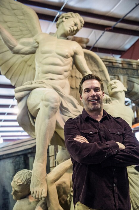 (Chris Detrick  |  Salt Lake Tribune file photo) Entrepreneur Ken Bretschneider poses with a sculpture of "Michael Defeating the Devil" that will be used in Evermore Adventure Park, one of the entertainment venues he's developing in Utah County that will emphasize the use of virtual-reality gear.