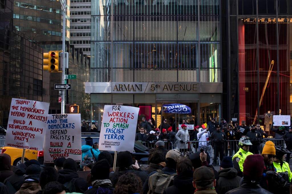 (Dave Sanders | The New York Times) Protesters and counter-protesters outside Trump Tower in Manhattan, Nov. 16, 2019. Liberals end up analyzing populism exclusively through their digital experience even when that analysis is obviously insufficient, Ross Douthat writes.