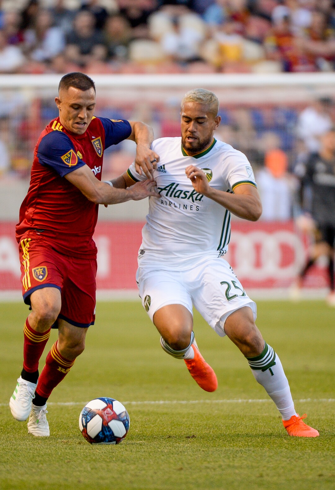 Leah Hogsten  |  The Salt Lake Tribune Real Salt Lake defender Donny Toia (4) and Portland Timbers defender Bill Tuiloma (25) battle for possession.  Real Salt Lake hosts the Portland Timbers, Saturday, May 4, 2019 at Rio Tinto Stadium in Salt Lake City.