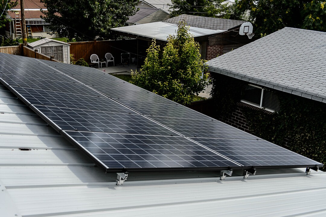 (Trent Nelson  |  The Salt Lake Tribune)  Solar panels on the roof of Erin and Ray Searles's Rose Park home, Friday August 4, 2017. Rocky Mountain Power has proposed a new rate schedule for customers with solar panels. The proposal would disproportionately impact low- and moderate-income households while giving wealthier households a break.