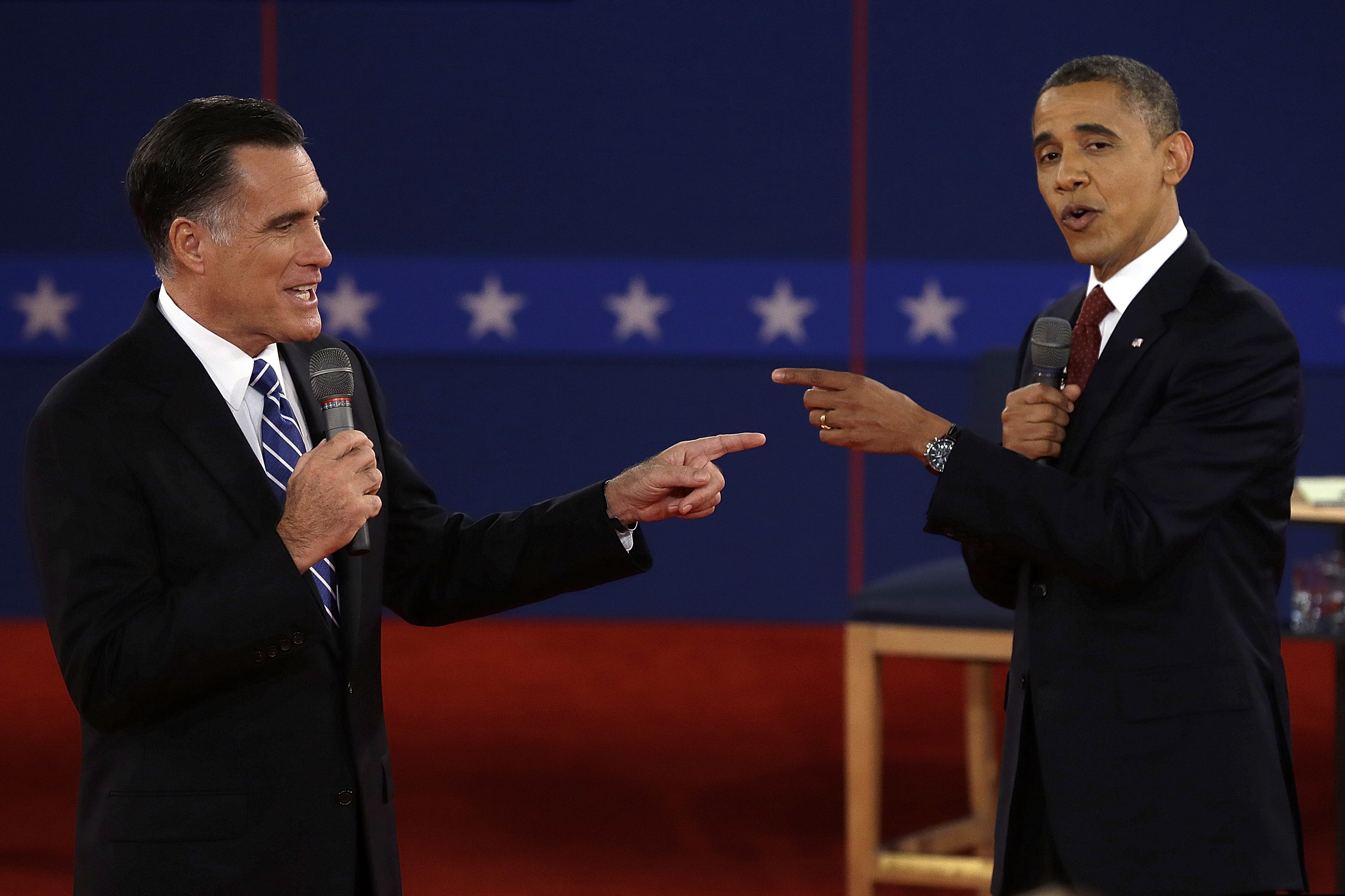 (Charlie Neibergall | AP file photo)

In this Oct. 16, 2012, photo, Republican presidential nominee Mitt Romney, left, and President Barack Obama spar during a presidential debate at Hofstra University in Hempstead, N.Y.