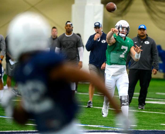 (Steve Griffin  |  The Salt Lake Tribune)  BYU quarterback Beau Hoge fires a pass downfield during spring football practice at the indoor practice facility in Provo Thursday March 15, 2018.