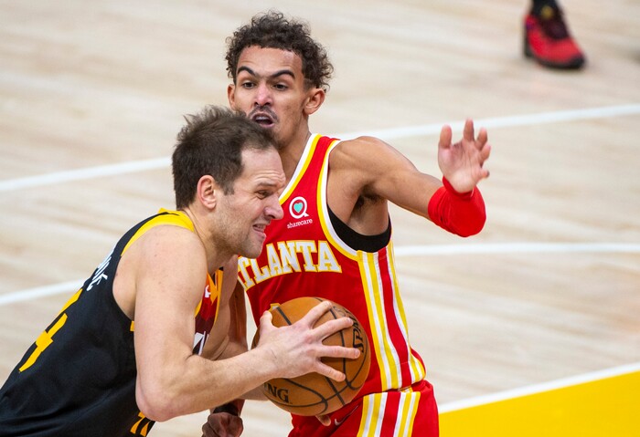 (Rick Egan | The Salt Lake Tribune) Utah Jazz forward Bojan Bogdanovic (44) takes the ball to the hoop, as Atlanta Hawks guard Trae Young (11) defends, in NBA action between the Utah Jazz and the Atlanta Hawks at Vivint Arena, on Friday, Jan. 15, 2021.