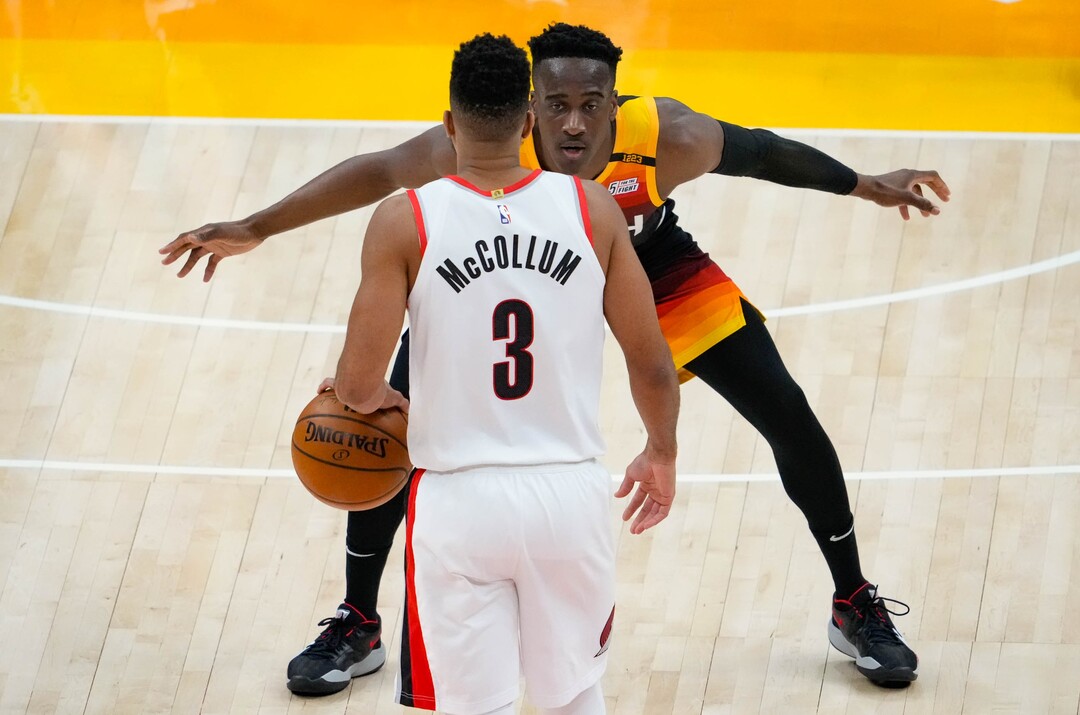 (Francisco Kjolseth | The Salt Lake Tribune) Utah Jazz guard Miye Oni (81) runs defense on Portland Trail Blazers guard CJ McCollum (3) in NBA action between the Utah Jazz and the Portland Trail Blazers, at Vivint Smart Home Arena, on Wednesday, May 12, 2021.