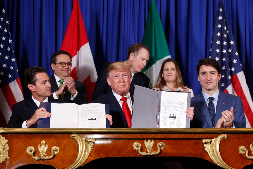 (Pablo Martinez Monsivais  |  AP Photo)  President Donald Trump, Canada's Prime Minister Justin Trudeau, right,  and Mexico's President Enrique Pena Neto, left, participate in the USMCA signing ceremony, Friday, Nov. 30, 2018 in Buenos Aires, Argentina.
