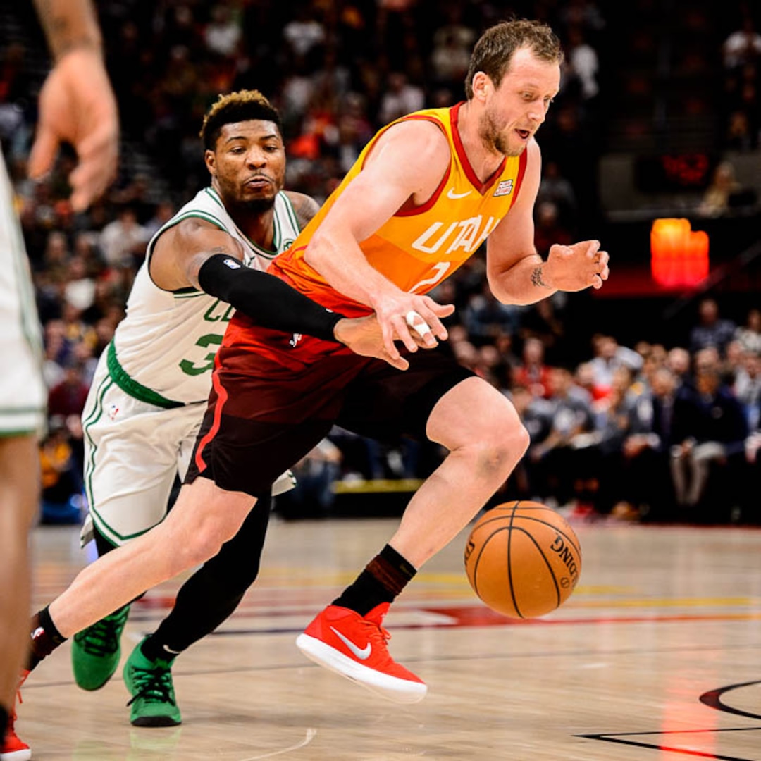 (Trent Nelson | The Salt Lake Tribune)  Utah Jazz forward Joe Ingles (2) wrapped up by Boston Celtics guard Marcus Smart (36). Utah Jazz vs. Boston Celtics, NBA basketball in Salt Lake City on Friday Nov. 9, 2018.