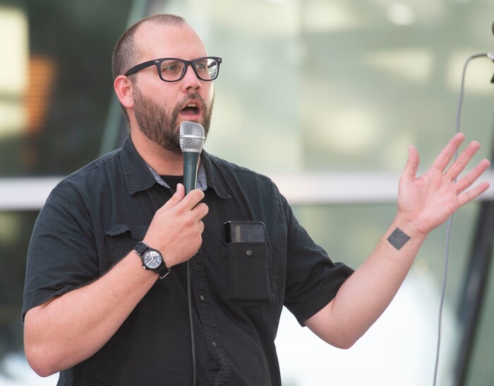 (Rick Egan  |  The Salt Lake Tribune)     Dave Newlin from Utah Against Police Brutality, leads the crowd in a chant, during a protest at the Salt Lake City Police Station, Tuesday, July 23, 2019.