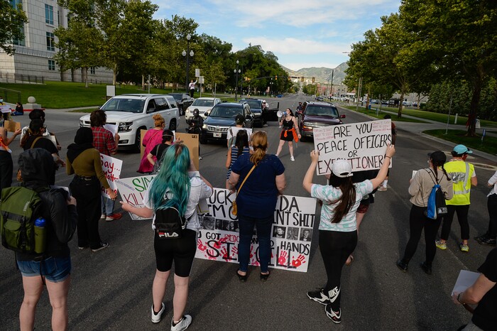 (Francisco Kjolseth  |  The Salt Lake Tribune) Sofia Alcala leads the crowd as they chant during a Rally for Bernardo Palacios, in front of the Salt Lake County District Attorney's office and block traffic along 500 S. on Thursday, June 18, 2020.