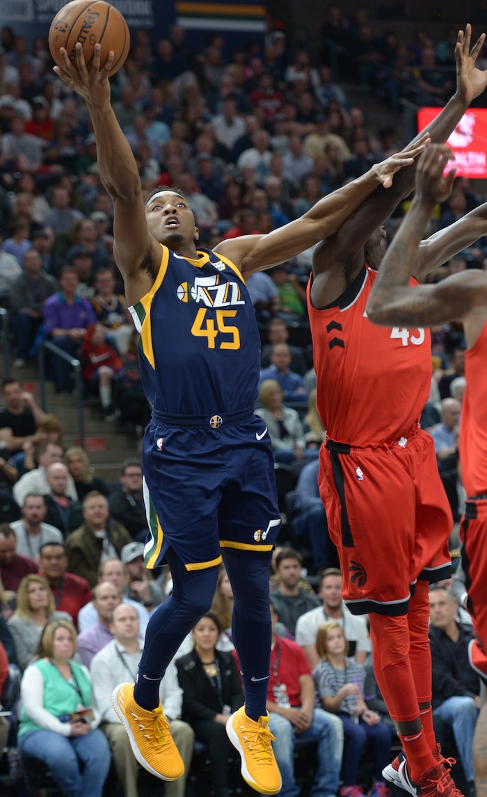 (Leah Hogsten  |  The Salt Lake Tribune) Utah Jazz guard Donovan Mitchell (45) rises to the net. The Utah Jazz lead the Toronto Raptors 54-53 at Vivint Smart Home Arena, Friday, November 3, 2017