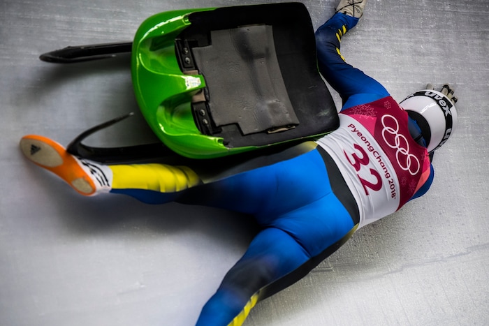 (Chris Detrick | The Salt Lake Tribune) Ukraine's Andriy Mandziy falls off of his sled while competing in the Men's Singles at the Olympic Sliding Centre during the Pyeongchang 2018 Winter Olympics Saturday, February 10, 2018.