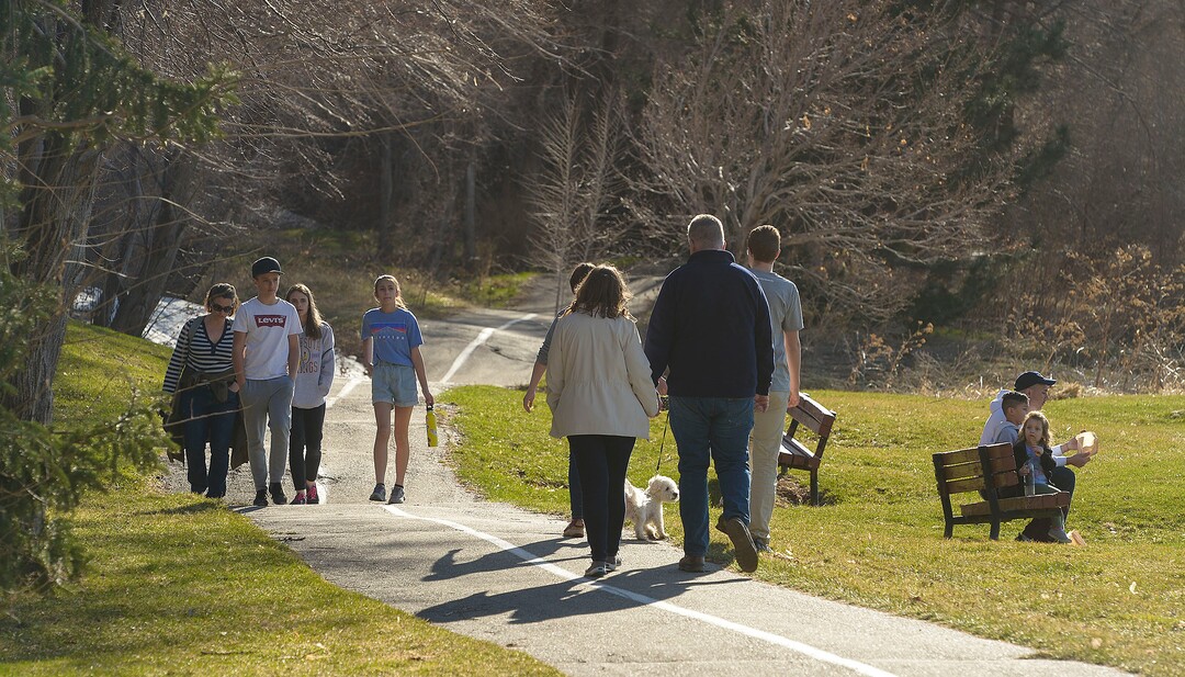(Leah Hogsten  |  The Salt Lake Tribune) Families and friends congregate at Big Dee Park in Ogden on Sunday after hiking and biking the nearby Ogden River Trail on March 22, 2020. As the global battle against COVID-19 deepens, some Utahns have used the state's great outdoors as an alternative to isolating at home.