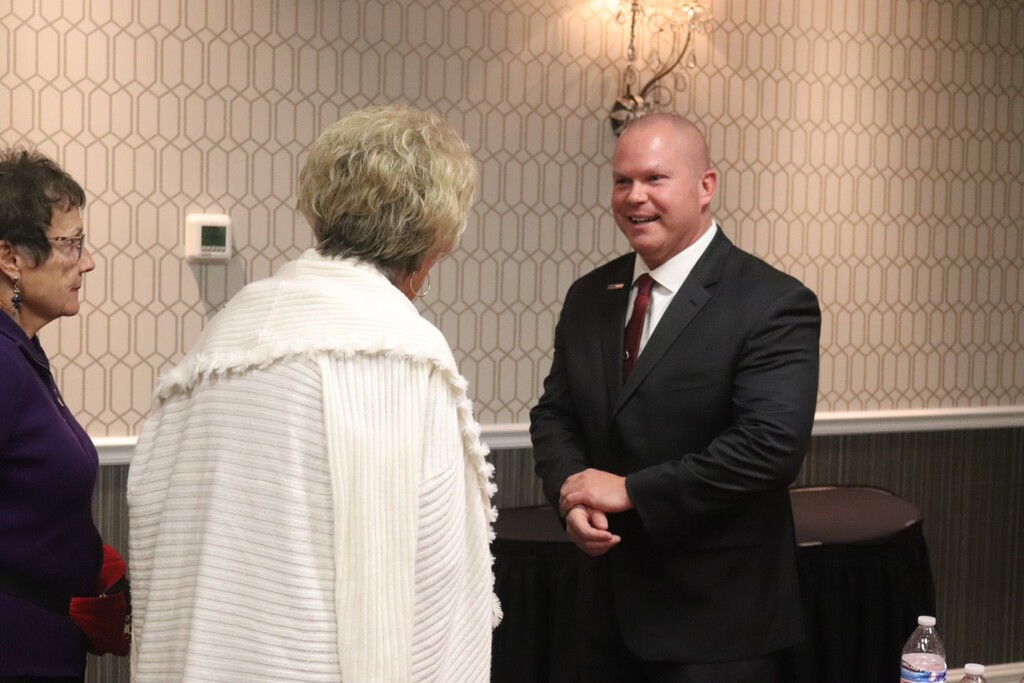 (Mori Kessler | St. George News) Washington County Undersheriff Nate Brooksby speaks to a delegate of the Washington County Central Committee prior to a special election held to pick the next county sheriff, St. George, Nov. 30, 2021.