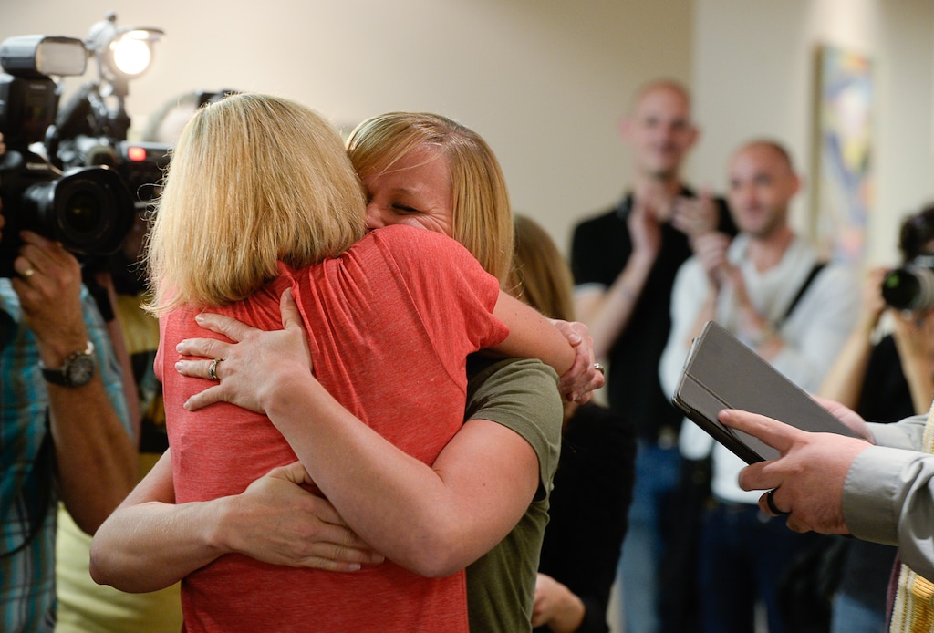 Francisco Kjolseth  |  The Salt Lake Tribune
A couple marry in 2014 in Salt Lake City. The "Mormon Land" podcast this week focuses on the Respect for Marriage Act, which would codify same-sex marriage.