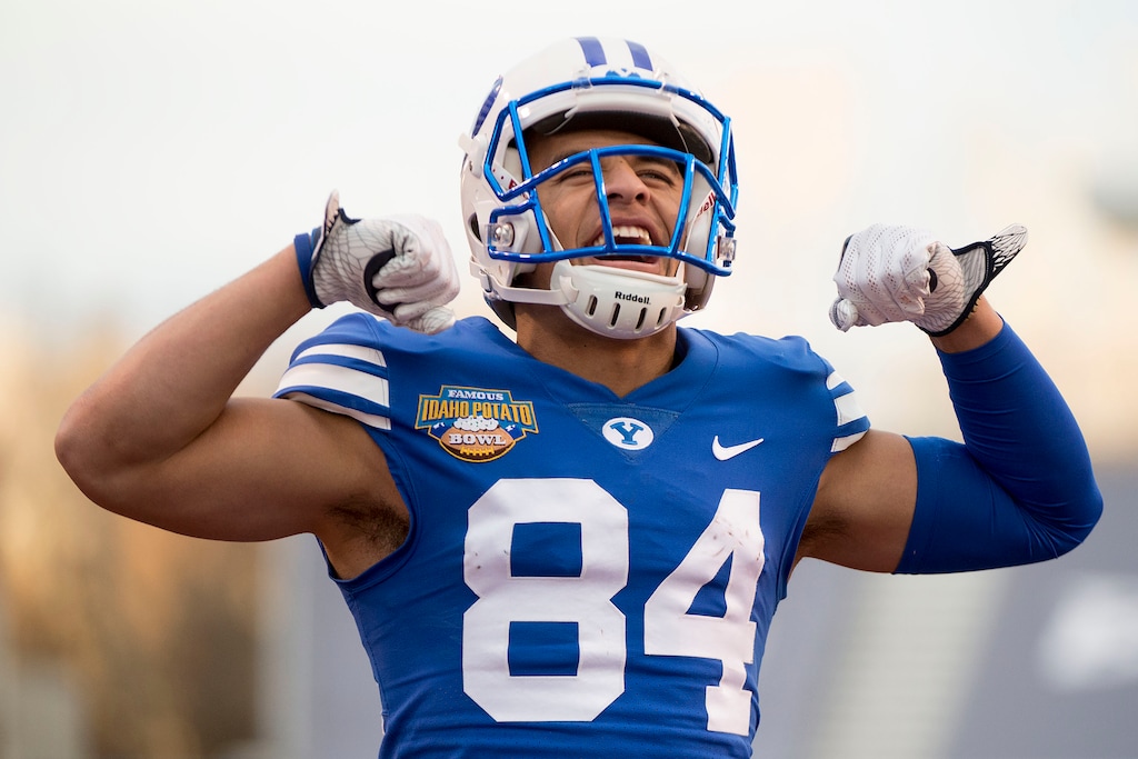 (Jeremy Harmon  |  The Salt Lake Tribune) Brigham Young Cougars wide receiver Neil Pau'u (84) flexes as he celebrates as BYU faces the Western Michigan Broncos in the Famous Idaho Potato Bowl in Boise, Idaho, on Friday, Dec. 21, 2018.