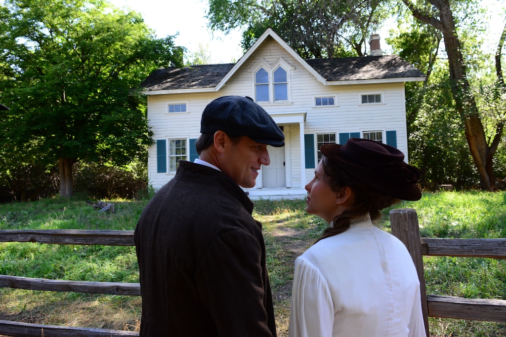 (Photo courtesy of Purdie Distribution) Willard Bean (Dave McConnell, left) and his wife, Rebecca (Cassidy Hubert) arrive at the farmhouse where Joseph Smith lived, as they take their roles as missionaries in Palmyra, N.Y., in 1915, in a scene from the movie "The Fighting Preacher."