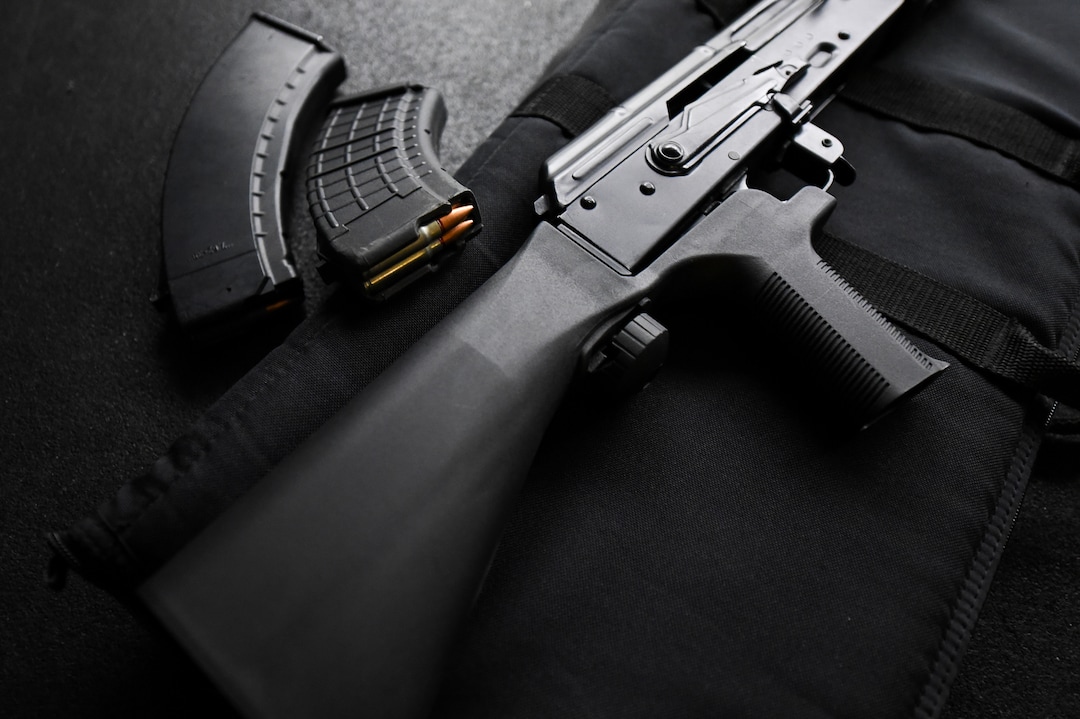 (Francisco Kjolseth  |  The Salt Lake Tribune)  A bump stock is pictured on an AKM-47 owned by Utah gun right advocate Clark Aposhian, one of only a handful of Americans who are legally allowed to keep their bump stock, a shooting accessory that alters semi-automatic rifles to fire in quick bursts like a machine gun. He is challenging the bump stock ban in court, and an appeals court has allowed him to keep his bump stock until his case is resolved in court.