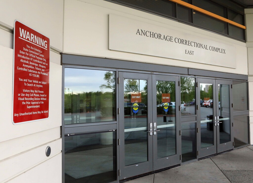 This photo shows the public entrance to the Anchorage Correctional Complex on Wednesday, May 23, 2018, in Anchorage, Alaska. Muslim inmates are suing state corrections officials, claiming that officials at the jail are providing them with inadequate nourishment as they break their daily fasts during Ramadan. (AP Photo/Dan Joling)