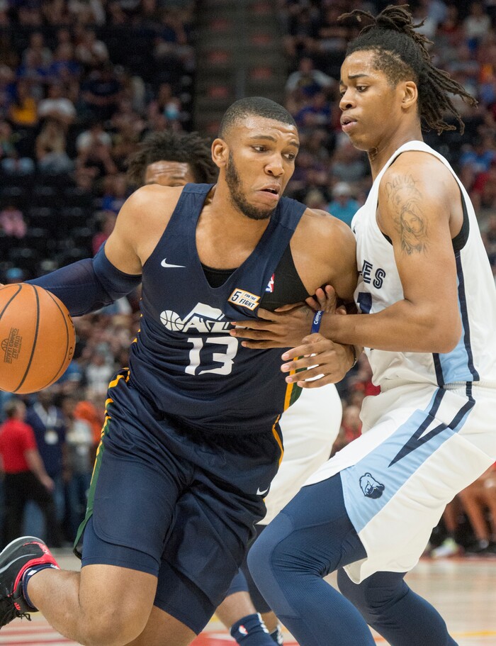 (Rick Egan  |  The Salt Lake Tribune)      Utah Jazz center Tony Bradley (13) works the ball inside, as Memphis Grizzlies center Deyonta Davis (21) defends, in Utah Jazz summer league action between Utah Jazz and Memphis Grizzlies in Salt Lake City, Tuesday, July 3, 2018.