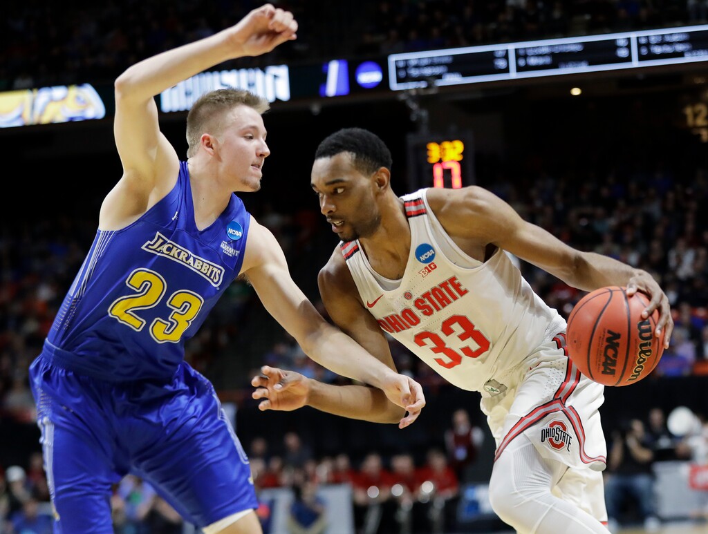 Ohio State forward Keita Bates-Diop (33) drives against South Dakota State guard Reed Tellinghuisen (23) during the first half of a first-round game in the NCAA college basketball tournament, Thursday, March 15, 2018, in Boise, Idaho. (AP Photo/Otto Kitsinger)
