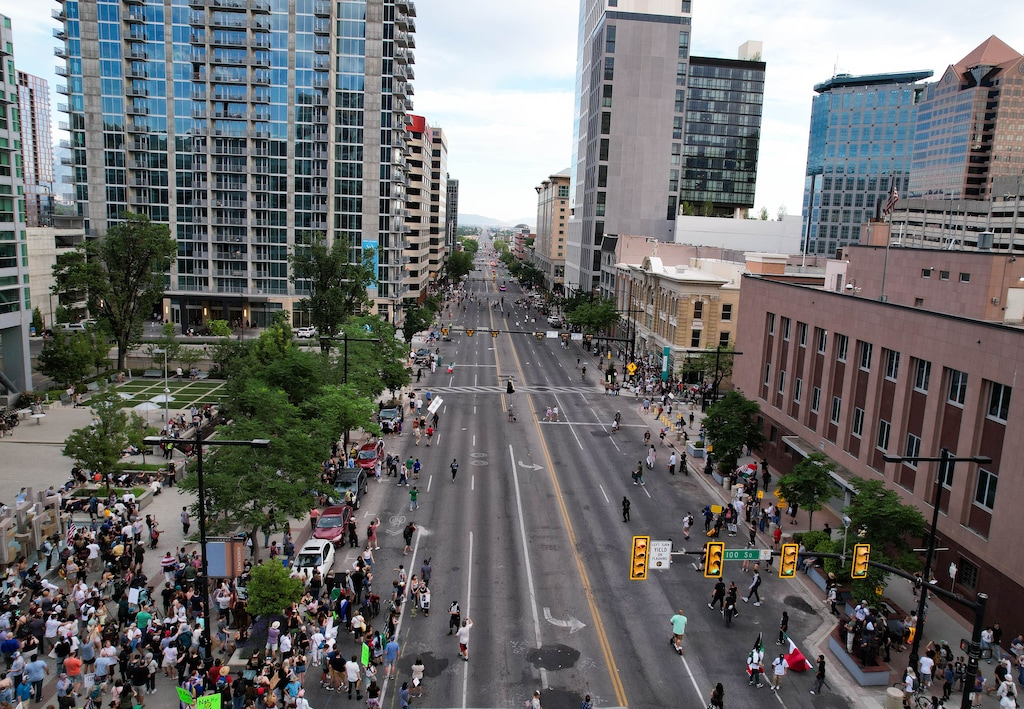 (Francisco Kjolseth | The Salt Lake Tribune) Thousands scatter in downtown Salt Lake City after shots ring out at a "No Kings" protest on Saturday, June 14, 2025.