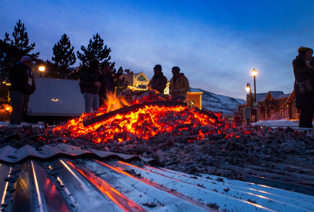 (Rick Egan  |  The Salt Lake Tribune)     People gather around the first-ever Sundance bonfire, a community gathering on Swede Alley, in Park City, Thursday, Jan. 30, 2020.