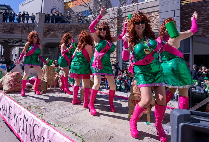 (Rick Egan | The Salt Lake Tribune) The Potato Girls dance on a float in the St. Patricks Parade at the Gateway in Salt Lake City, on Saturday, March 12, 2022.
