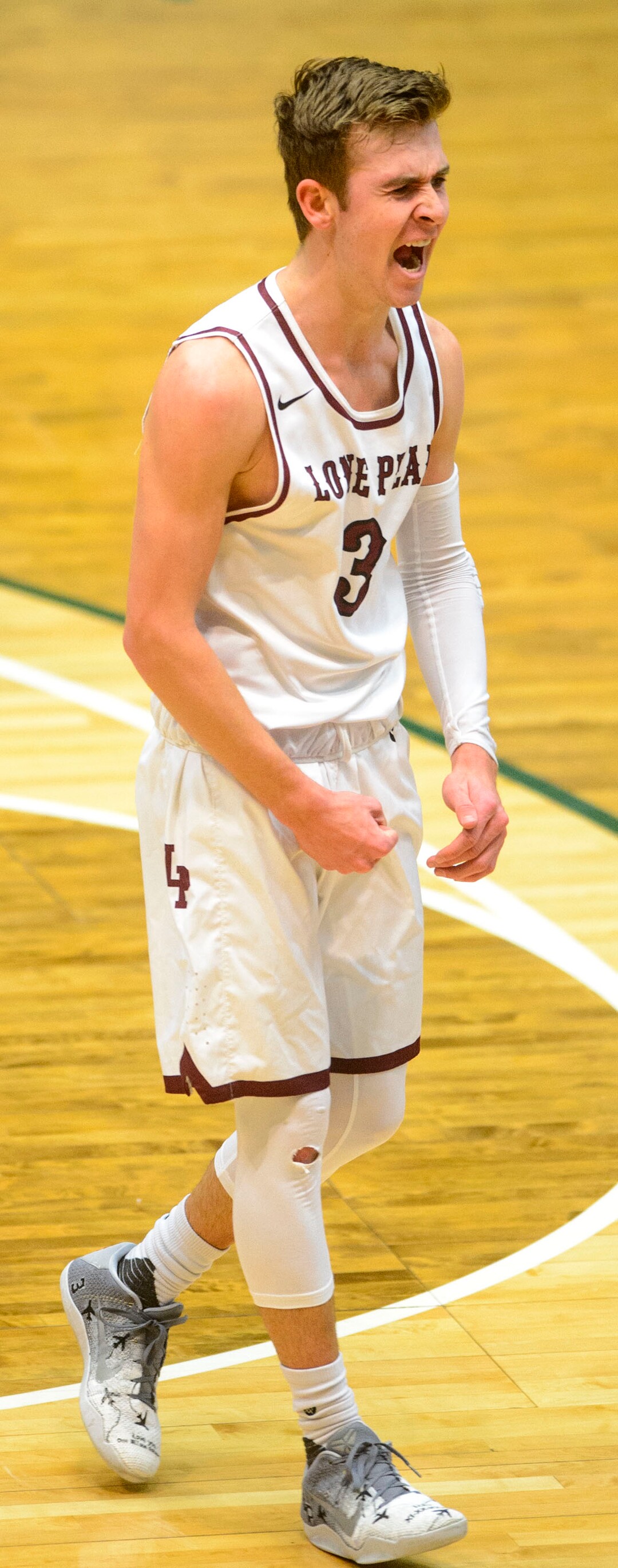 (Steve Griffin  |  The Salt Lake Tribune) Lone Peak's Steven Ashworth gets fired up after scoring and getting fouled during 6A basketball playoff game against Herriman at the Utah Valley UniversityÕs UCCU Center in Provo Tuesday Feb. 27, 2018.