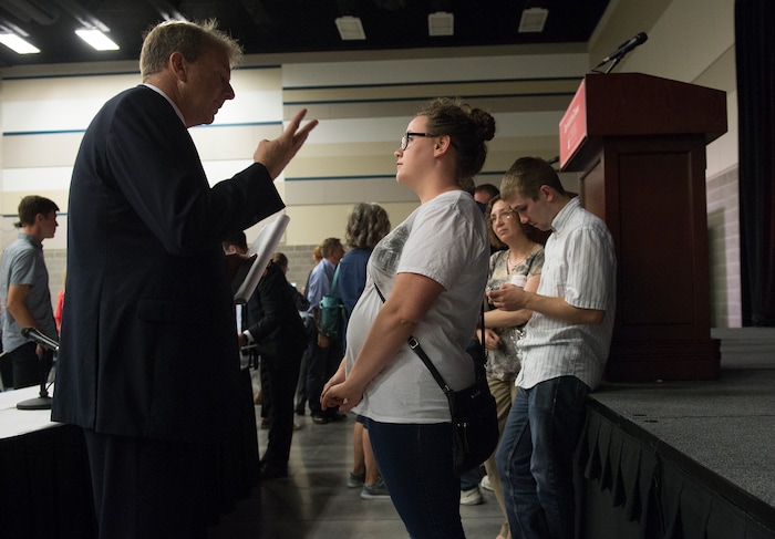 Leah Hogsten | The Salt Lake Tribune
"I thought I'd come out and hear what they had to say," said Democrat Monica Nelson of Springville while listening to Third District primary candidate former state Rep. Chris Herrod after The Salt Lake Tribune-Hinckley Institute of Politics debate, July 28, 2017, at the Utah Valley Convention Center in Provo. The primary will be held Aug. 15.