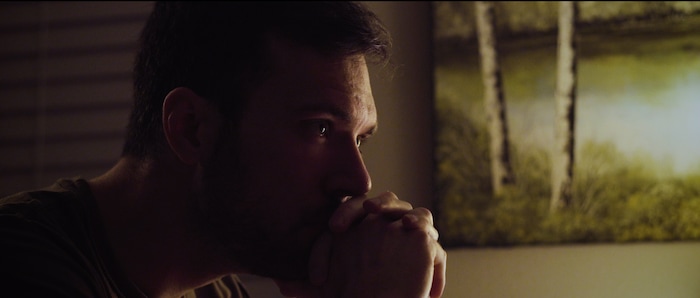 (Aaron Hurt | courtesy photo) A man (Aaron Hurt, who also directed) tries to decipher strange knocks on the wall in the drama "Mirrors," one of the short films in The Salt Lake Tribune's Quarantine Film Festival.