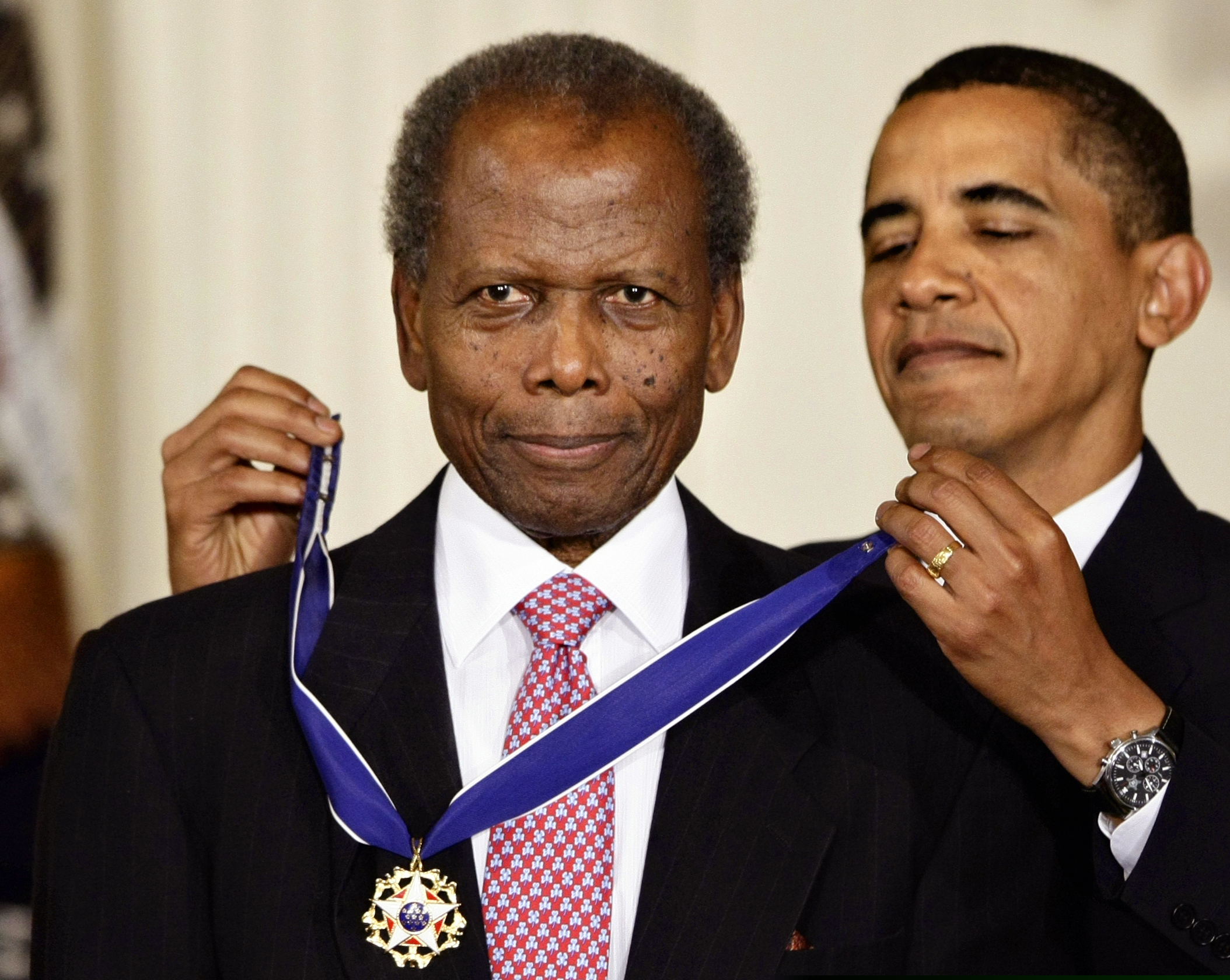 (J. Scott Applewhite | AP photo)

President Barack Obama presents the 2009 Presidential Medal of Freedom to Sidney Poitier during ceremonies in the East Room at the White House in Washington on Aug. 12, 2009.