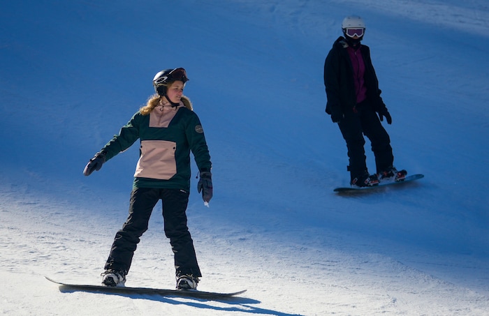 (Bethany Baker | The Salt Lake Tribune) Two snowboarders recreate at Sundance Resort near Provo on Thursday, Dec. 14, 2023.