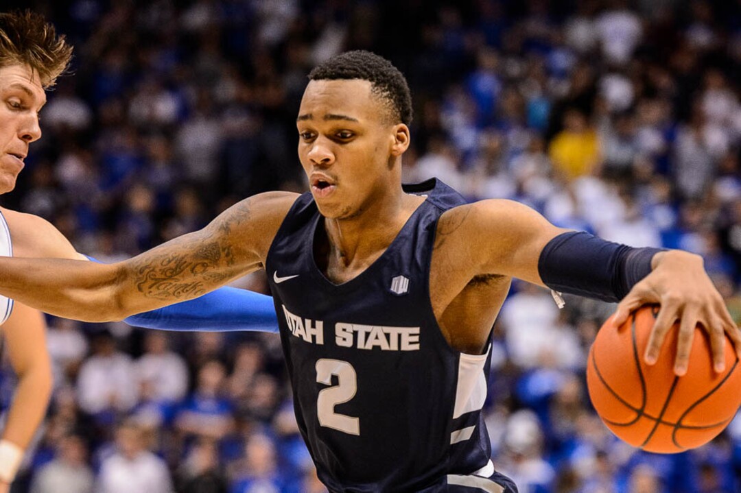 (Trent Nelson | The Salt Lake Tribune)  Utah State Aggies forward Dwayne Brown Jr. (2) and Brigham Young Cougars forward Dalton Nixon (33) as BYU hosts Utah State, NCAA basketball in Provo on Wednesday Dec. 5, 2018.