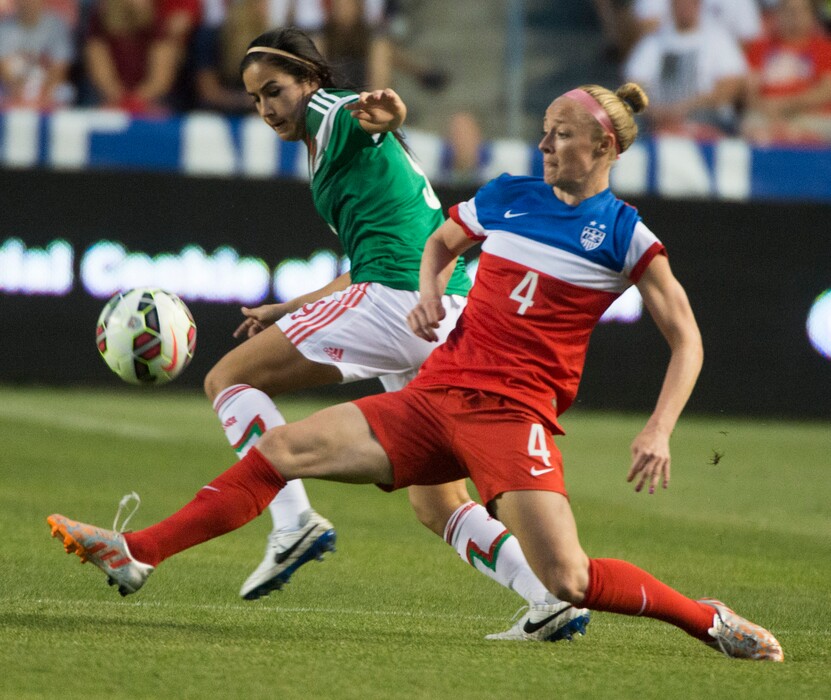 Rick Egan | The Salt Lake Tribune
Becky Sauerbrunn (4)USA, gets her foot on the ball, as Tanya Samarzich (9), Mexico, defends, in Soccer action, U.S. Women's National Team, vs. Mexico, Saturday, September 13, 2014
