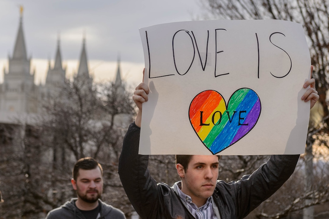 (Trent Nelson  |  The Salt Lake Tribune) Demonstrators at a rally about BYU's changing position on “romantic behavior” by same-sex couples gather in City Creek Park in Salt Lake City on Friday, March 6, 2020.