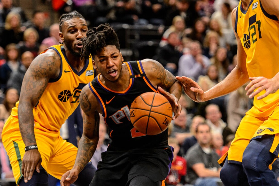 (Trent Nelson | The Salt Lake Tribune)  Phoenix Suns guard Elfrid Payton (2) drives between Utah Jazz forward Jae Crowder (99) and Utah Jazz center Rudy Gobert (27) as the Utah Jazz host the Phoenix Suns, NBA basketball in Salt Lake City, Wednesday Feb. 14, 2018.