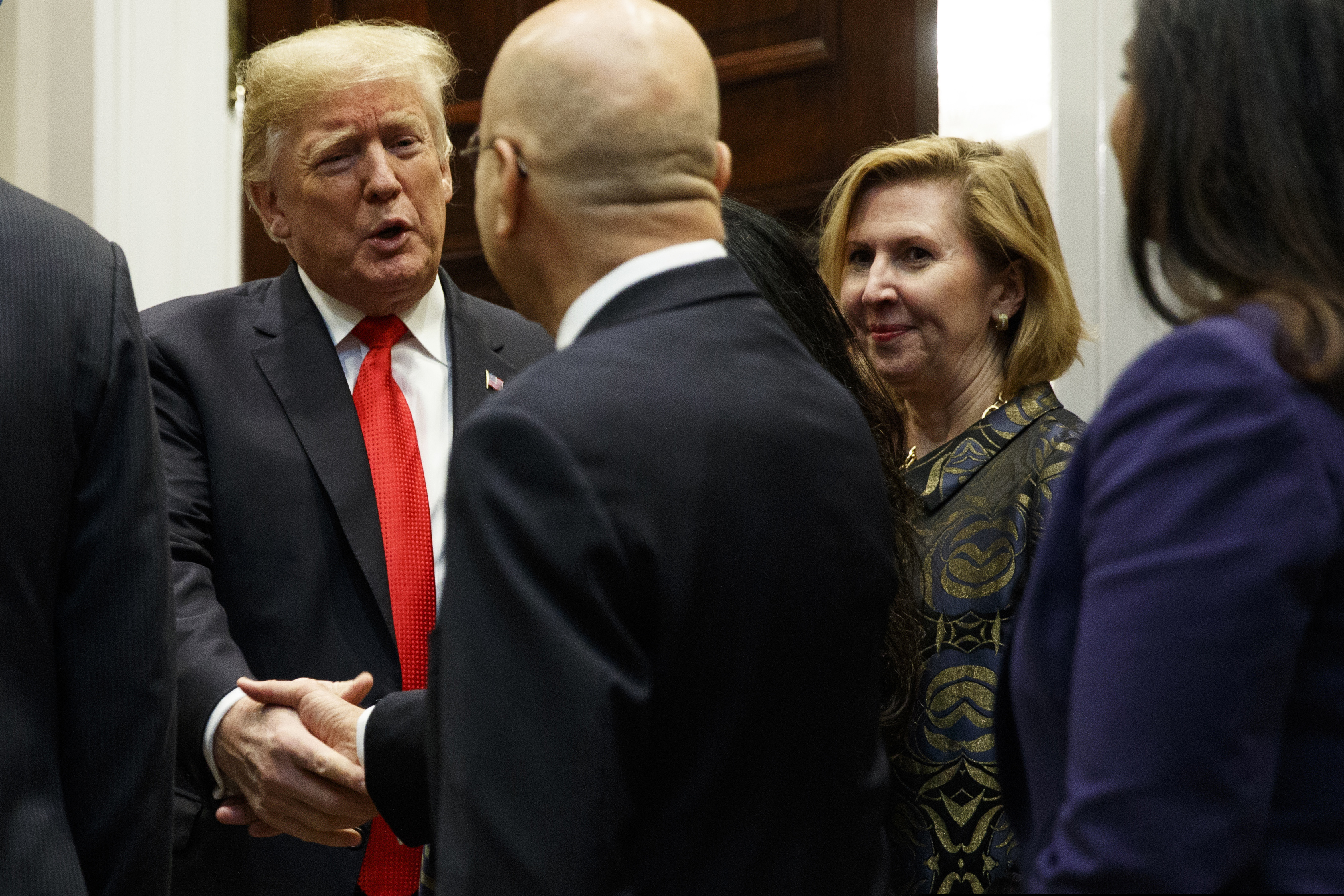 Deputy National Security Adviser Mira Ricardel, right, watches as President Donald Trump arrives for a Diwali ceremonial lighting of the Diya in the Roosevelt Room of the White House, Tuesday, Nov. 13, 2018, in Washington. In an extraordinary move, first lady Melania Trump is publicly calling for the dismissal of Ricardel. After reports circulated that the president had decided to remove Ricardel, the first lady’s spokeswoman issued a statement saying: “It is the position of the Office of the First Lady that she no longer deserves the honor of serving in this White House.” Ricardel is national security adviser John Bolton’s deputy. (AP Photo/Evan Vucci)