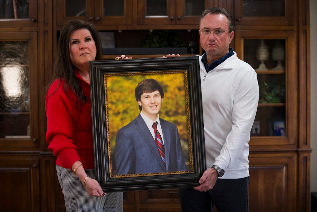 (Bethany Baker | The Salt Lake Tribune) Jennifer Toon and Bill Toon hold up a portrait of their son William Toon III, who was shot and killed by officers inside a Riverdale gas station. The Toons have filed a lawsuit against the officers, the Weber Morgan Narcotics Strike Force, and police departments in Ogden and Pleasant Grove.