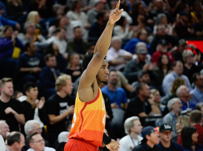 (Francisco Kjolseth  |  The Salt Lake Tribune)  Utah Jazz guard Donovan Mitchell (45) sinks a three pointer as the Utah Jazz host the Denver Nuggets in their NBA game at Vivint Smart Home Arena Tuesday, April 9, 2019, in Salt Lake City.